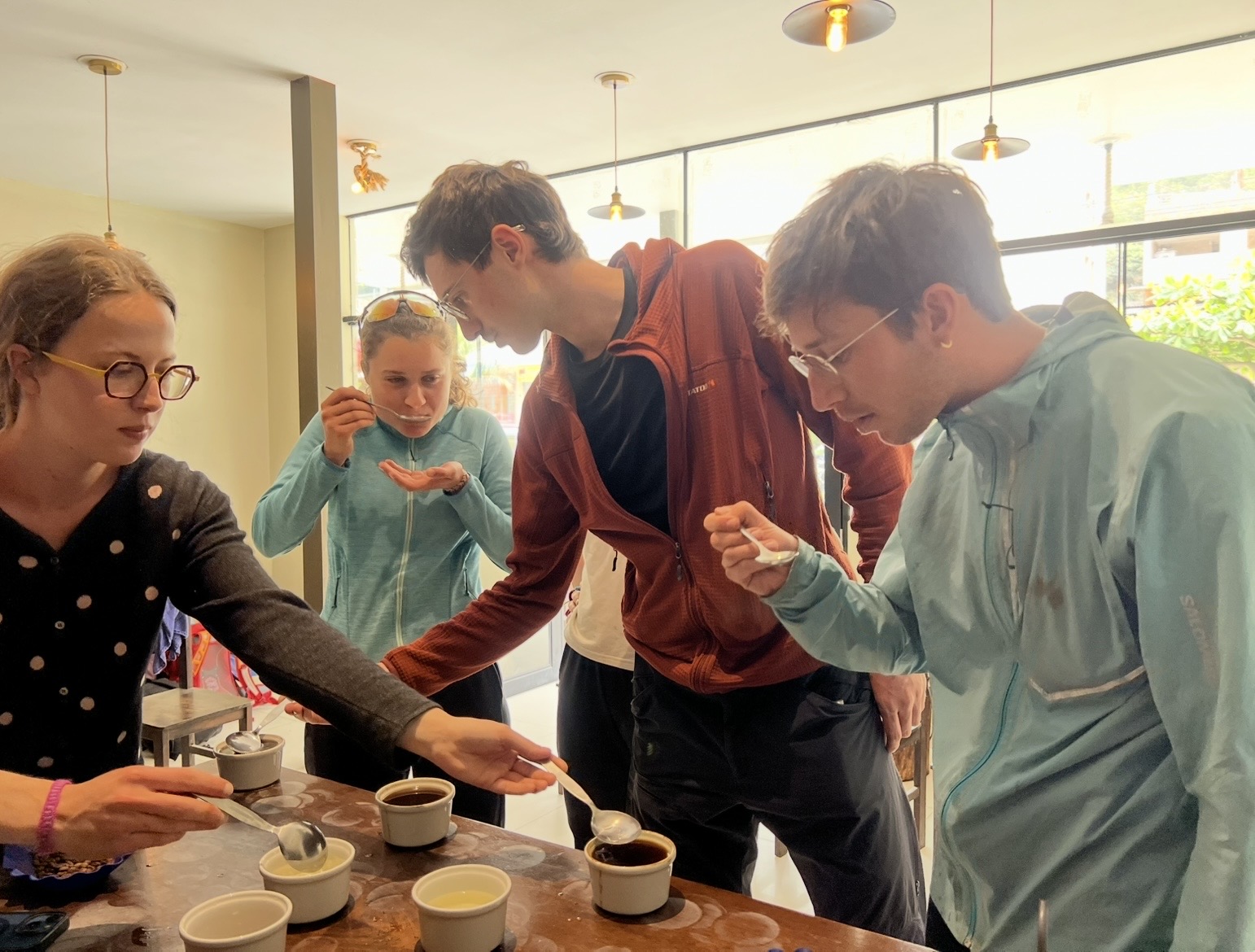 Group Tasting Coffee in Lab